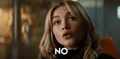 A Close Up Of A Woman 'S Face With The Word No In White Letters GIF