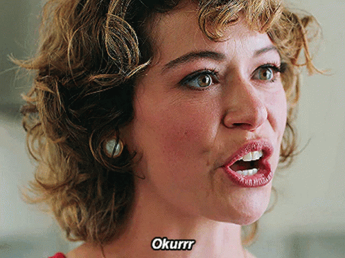 A Close Up Of A Woman 'S Face With The Word Okurrr Written Below Her GIF