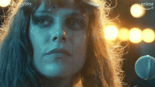A Close Up Of A Woman 'S Face With The Word Prime On The Bottom Left GIF