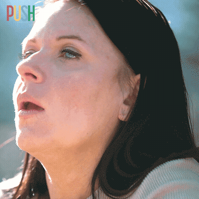 A Close Up Of A Woman 'S Face With The Word Push In The Corner GIF