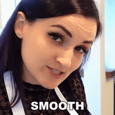 A Close Up Of A Woman 'S Face With The Word Smooth Written Below It GIF