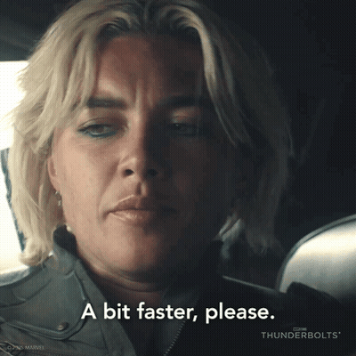 A Close Up Of A Woman 'S Face With The Words " A Bit Faster Please " GIF