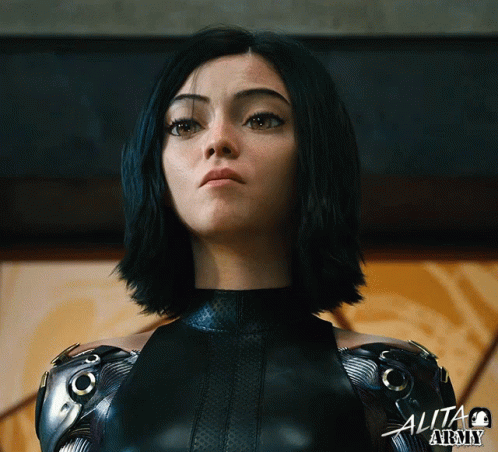 A Close Up Of A Woman 'S Face With The Words Alita Atomy On The Bottom GIF