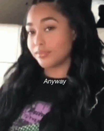 A Close Up Of A Woman 'S Face With The Words `` Anyway '' Written On Her Face . GIF