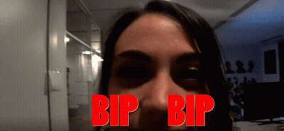 A Close Up Of A Woman 'S Face With The Words Bip Bip Written In Red GIF