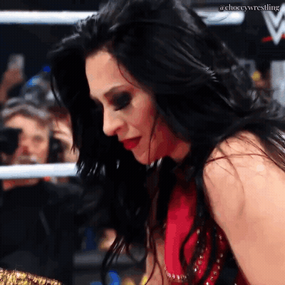 A Close Up Of A Woman 'S Face With The Words Choccywrestling On The Bottom GIF