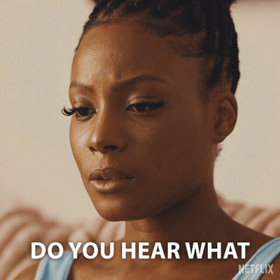 A Close Up Of A Woman 'S Face With The Words " Do You Hear What " On The Bottom GIF