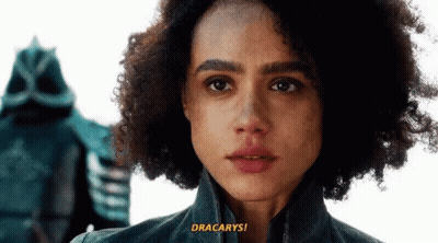 A Close Up Of A Woman 'S Face With The Words " Dracarys " On The Bottom Right GIF