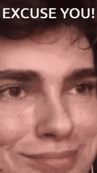 A Close Up Of A Woman 'S Face With The Words `` Excuse You ! '' GIF