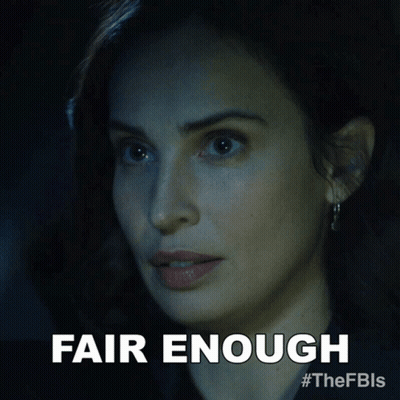 A Close Up Of A Woman 'S Face With The Words Fair Enough Below Her GIF