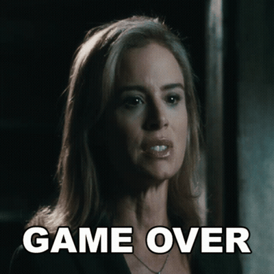 A Close Up Of A Woman 'S Face With The Words Game Over Behind Her GIF