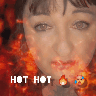 A Close Up Of A Woman 'S Face With The Words Hot Hot Written Below It GIF