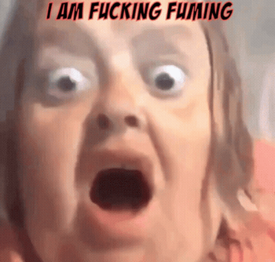 A Close Up Of A Woman 'S Face With The Words I Am Fucking Fuming Written Above Her GIF