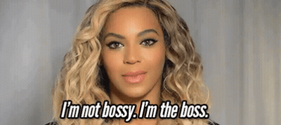 A Close Up Of A Woman 'S Face With The Words `` I 'M Not Bossy , I 'M The Boss '' GIF