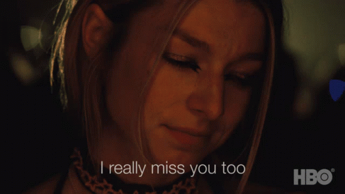 A Close Up Of A Woman 'S Face With The Words " I Really Miss You Too " Below Her GIF