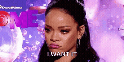 A Close Up Of A Woman 'S Face With The Words `` I Want It '' Written On It . GIF
