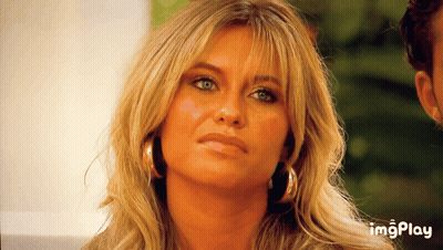 A Close Up Of A Woman 'S Face With The Words Imgplay Below GIF