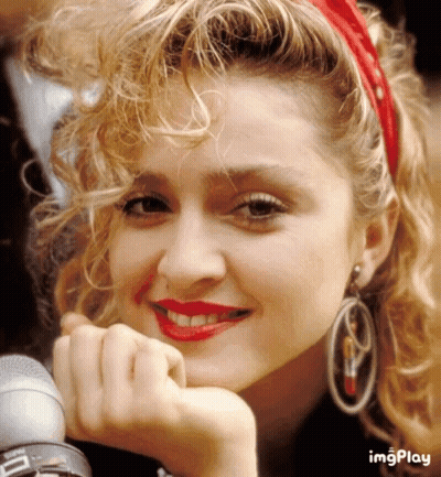 A Close Up Of A Woman 'S Face With The Words Imgplay Visible GIF
