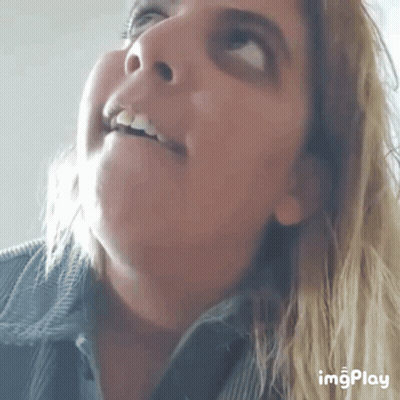 A Close Up Of A Woman 'S Face With The Words Imgplay Visible GIF