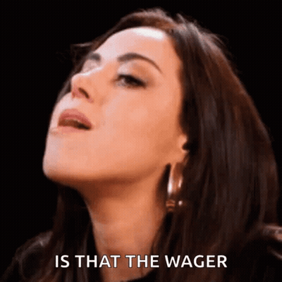 A Close Up Of A Woman 'S Face With The Words `` Is That The Wager '' Written On The Bottom . GIF