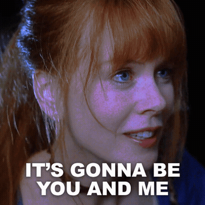 A Close Up Of A Woman 'S Face With The Words " It 'S Gonna Be You And Me " GIF