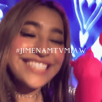 A Close Up Of A Woman 'S Face With The Words #Jimenamtvmiaw Visible GIF