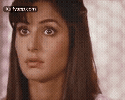 A Close Up Of A Woman 'S Face With The Words Kulfyapp.com In The Corner GIF