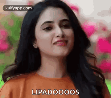A Close Up Of A Woman 'S Face With The Words Lipadooos On It . GIF