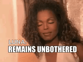A Close Up Of A Woman 'S Face With The Words `` Luna : Remains Unbothered '' Written On It GIF