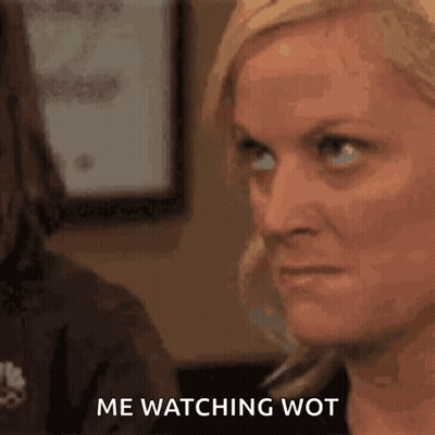 A Close Up Of A Woman 'S Face With The Words Me Watching Wot Written Below Her . GIF