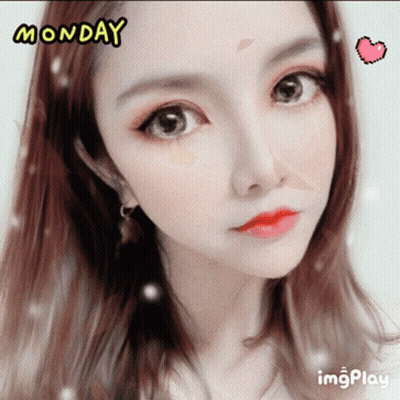 A Close Up Of A Woman 'S Face With The Words Monday Written Above Her GIF