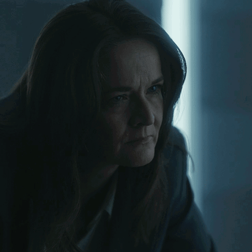 A Close Up Of A Woman 'S Face With The Words No Deal Behind Her GIF