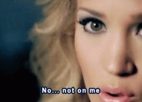 A Close Up Of A Woman 'S Face With The Words " No ... Not On Me " Written Below Her GIF