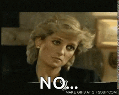 A Close Up Of A Woman 'S Face With The Words " No " On The Bottom GIF
