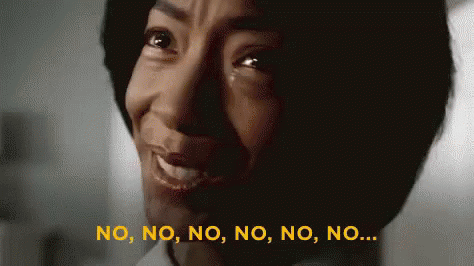 A Close Up Of A Woman 'S Face With The Words No On The Bottom Right GIF