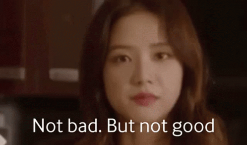 A Close Up Of A Woman 'S Face With The Words `` Not Bad But Not Good '' Written On The Bottom . GIF