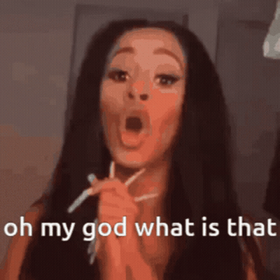 A Close Up Of A Woman 'S Face With The Words Oh My God What Is That GIF