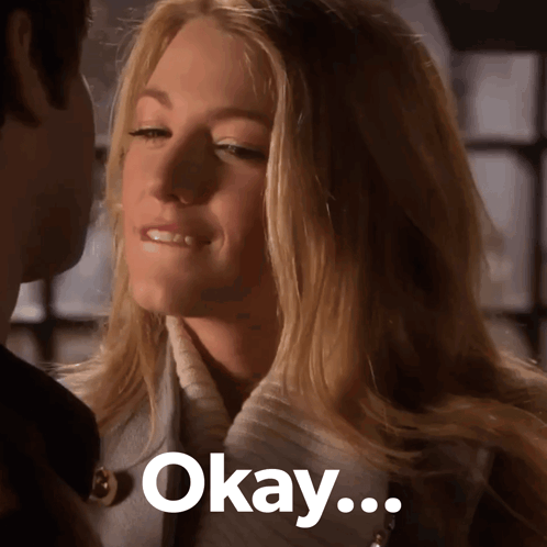 A Close Up Of A Woman 'S Face With The Words Okay Written Below Her GIF