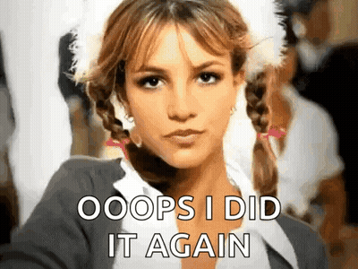 A Close Up Of A Woman 'S Face With The Words `` Oops I Did It Again '' Written Below Her . GIF