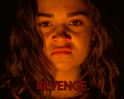 A Close Up Of A Woman 'S Face With The Words Revenge Written Above Her GIF