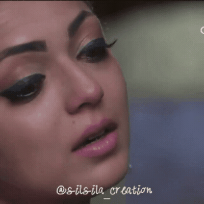 A Close Up Of A Woman 'S Face With The Words @S-Ils-Ila_creation Written Below It GIF