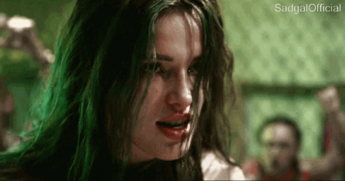 A Close Up Of A Woman 'S Face With The Words Sadgal Official Below Her GIF