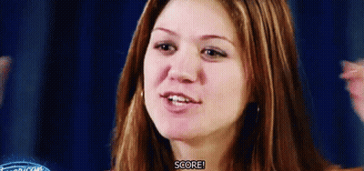 A Close Up Of A Woman 'S Face With The Words Score Visible GIF