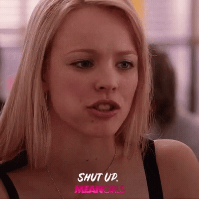 A Close Up Of A Woman 'S Face With The Words Shut Up Mean Girls Written Above Her GIF