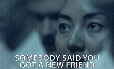 A Close Up Of A Woman 'S Face With The Words Somebody Said You Got A New Friend Above Her GIF