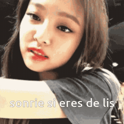 A Close Up Of A Woman 'S Face With The Words Sonrie Si Eres De Lis In The Corner GIF