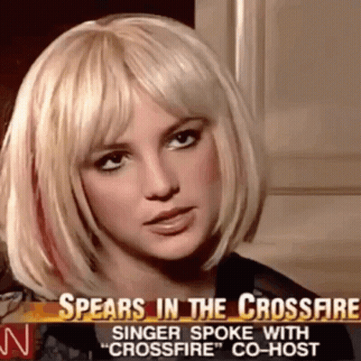 A Close Up Of A Woman 'S Face With The Words Spears In The Crossfire Singer Spoke With " Crossfire " Co-Host GIF