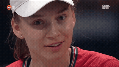 A Close Up Of A Woman 'S Face With The Words Stan Sport Visible GIF