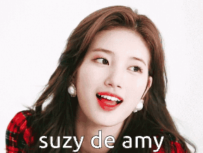 A Close Up Of A Woman 'S Face With The Words Suzy De Amy Written Below Her GIF