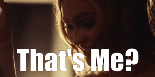 A Close Up Of A Woman 'S Face With The Words That 'S Me Behind Her GIF